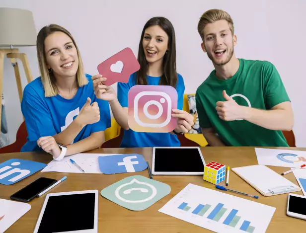 woman-holding-snapchat-logo-with-his-friends-showing-thumbup-sign