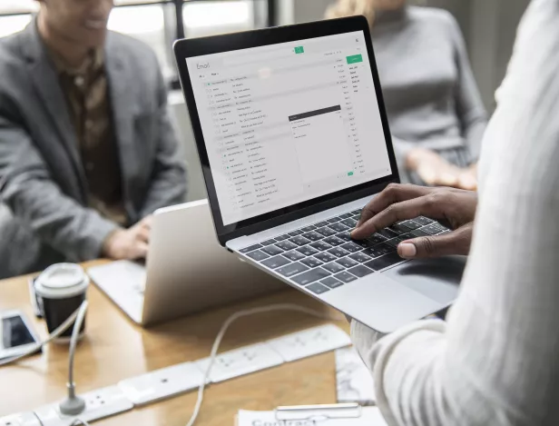 man-checking-his-email-laptop